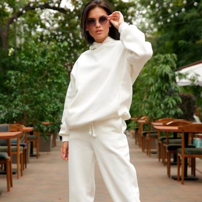 China Autumn and winter new fashion solid color women's sweatshirt QUICK DRY hooded sports suit two-piece suit for sale