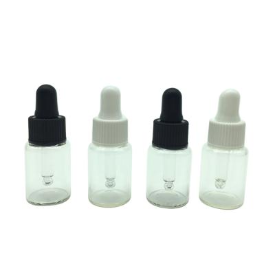 China Custom Size Cosmetic Skin Care Bottles Clear Mini Glass 2ml Serum Packaging Vial for sale