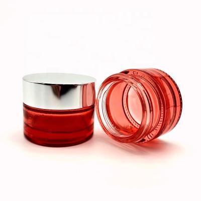 China Cosmetic Red Glass Jar 10g High Quality Flat Silver Eye Cylinder Shoulder Cream Cosmetic Screw Lid for sale