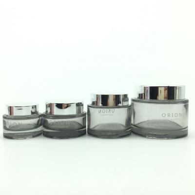 China Cosmetics 15g 30g 50g 100g High Grade Aluminum Lids Cylinder Glass Eye Face Cream Jars for sale