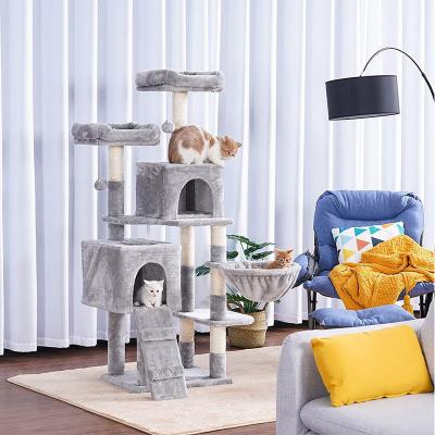 China Large Eco-Friendly Stocked Wooden Pet Cat Tree Toy Playing House Tower Activity Center With Hammock for sale