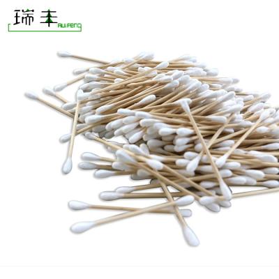 China Sterile disposable plastic bag wrapped disposable daily use wooden stick medical cotton swab for sale