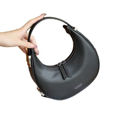 China Water Resistant Real Leather 2023 Manufacturer New Korean Niche Cowhide Moon Armpit Bag Half Round Shoulder Handbag for sale