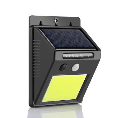 China Polycarbonate Outdoor Motion Sensor Solar Powered Waterproof Wall Light Safety LED Cordless Garden Lamp for sale