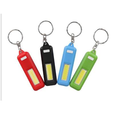 China Desktop Promotional COB Key Chain Led Key Chain Light 1*AA Plastic Batter Light Plastic Key Chain Light for sale