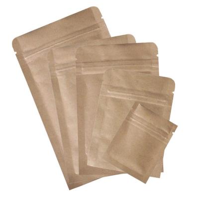 China 2020 Free Samples Security Standing Up Pouches Brown Kraft Paper Bag With Window for sale