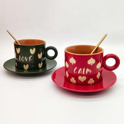 China Viable New Products Nordic Mr. and Mrs. Heart Silk Screen Printing Couple Ceramic Coffee Cups and Saucers with Spoon for sale