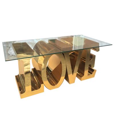 China Latest Modern Design Glass Top White Dining Table Love Letter Table for sale