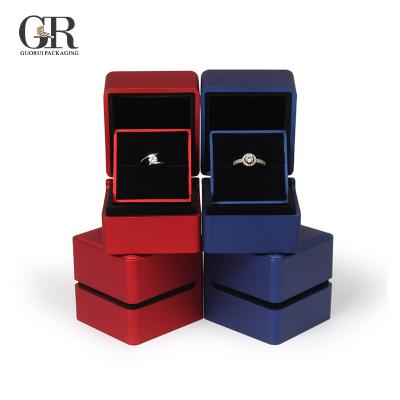 China New Logo Custom Luxury Gift Jewelry Box Wholesale 2020 Leather Wedding Ring Led Light Jewelry Box for sale