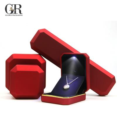 China Customized best quality Guorui red velvet led ring light box, high quality led light jewelry box for sale