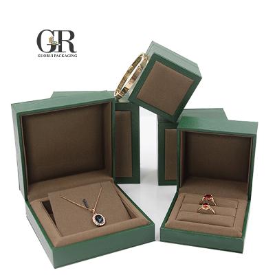 China Guorui Logo Printed Luxury Wholesale Velvet Green Custom Jewelry Box Hinge, Wedding Ring Box for sale