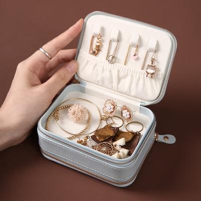 China Guorui travel leather portable jewelry box, mini small portable exquisite earrings, necklaces, jewelry storage boxes for sale