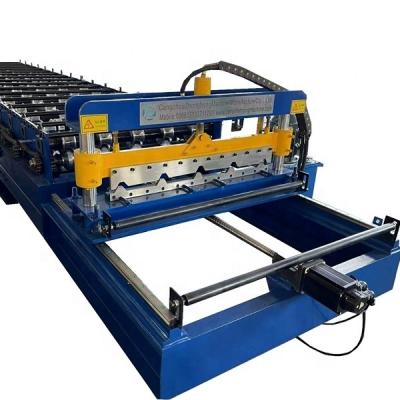 China Hotels High Speed ​​Track Cutting Metal Roofing Panel Roll Forming Machine for sale