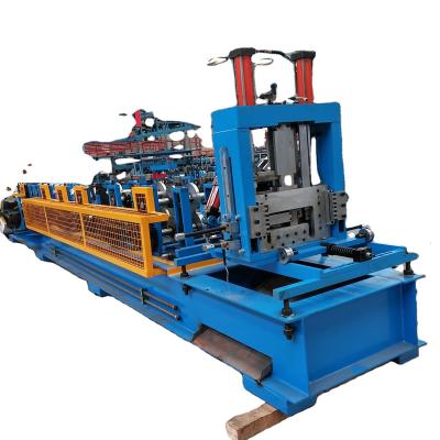 China Garment Shops Wholesale Building Material Making Machinery Parts Galvanized Steel C Z Purlin Punch Roll Forming Machine for sale