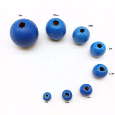 China Eco-Freindly Premium Material Natural Bulk Colored Craft Wooden Beads Round Material for sale