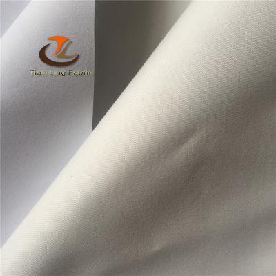 China 100%polyester microfiber 2pass 3pass 4 pass tela de cortines antistatic roll material black blind cloth for sale