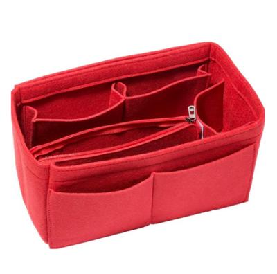 China Eco-friendly / fashionable / durable customized multi-pocket cosmetic storage packaging bag insert felt cosmetic bag for sale