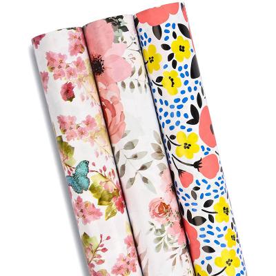 China Hot Selling Popular Wholesale Industrial Waterproof Custom Printed Kraft Paper Rolls For Gift Wrapping for sale