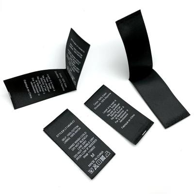 China Customizable custom factory price sustainable content clothing wash label satin label wash care label roll en venta