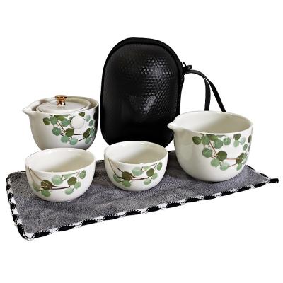 China 4 Pieces Viable Green Vines Design Portable Ceramic Travel Tea Set One Pot And Two Mugs And A Filter Cup for sale