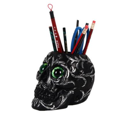 China Hot Selling Creative Home Office Pencil Pen Holder Halloween Prop PVC Skeleton Skull Head Storage Desk Fancy Pen Holder for sale