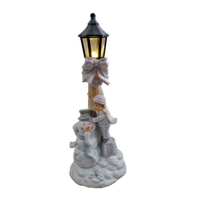 China Christmas Home Decor New Christmas Street Lamp Post Resin Lantern Christmas With Snowman for sale