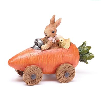 China Resin Easter Bunny Car Figurine From Europe Decoration Bunny And Chick In Carrot for sale