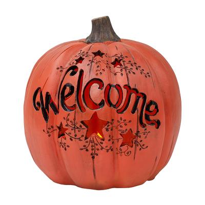 China Orange Stone Harvest Europe Welcome LED Pumpkin Resin Collectible Figurine for sale