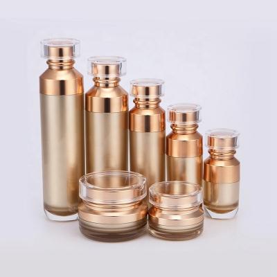 中国 2019 New Design Gold Personal Care Luxury Plastic Skin Care Packaging Lotion 100Ml Bottles 50g Acrylic Jar For Cosmetic 販売のため