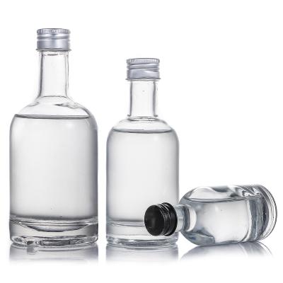 China Glass Liquid Packing Bottle 100ml 200ml 375ml 500ml 750ml Vodka Bottle With Screw Cap for sale