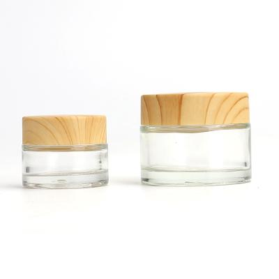 China Wholesale Cosmetic Clear Frosted Glass Bamboo Lid 1oz 2oz Eye Jar Wood Grain Plastic Cream With Plastic Inner for sale