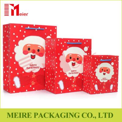 China Christmas Santa Claus Pattern Handbag Xmas Decor Wedding Candy Gift Paper Bags for sale