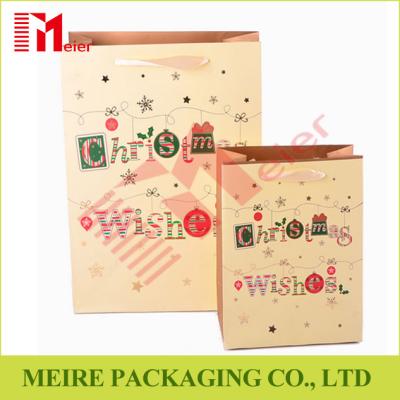 China Brown kraft Christmas printing Foldable premium paper bag with ribbon handle for sale