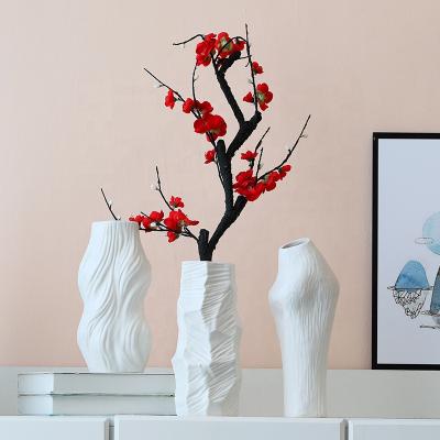 China Elegant Matte White Ceramic Flower Vase Europe Table Vase Unique Geometric Textured Porcelain Modern Nordic Luxury Home Decor Abstract for sale