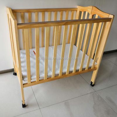 China USA Foldable Collapsible Baby Bed Crib Hotel Solid Wood Furniture for sale