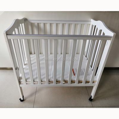 China Hot Sale Folded Baby Crib America Baby Crib Safety Solid Wood Infant Bed for sale