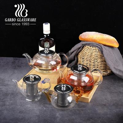 China Sustainable Hand Blown Glass Teapot With Filter Borosilicate Glass Hot Teapot With Stainless Steel Lid And Handle Clear 850ml Glasses for sale