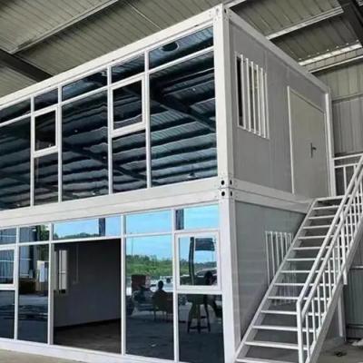 China Construction Site Expandable Steel Luxury Container House With Blue Steel Door And Composite Wood Board Floor for sale