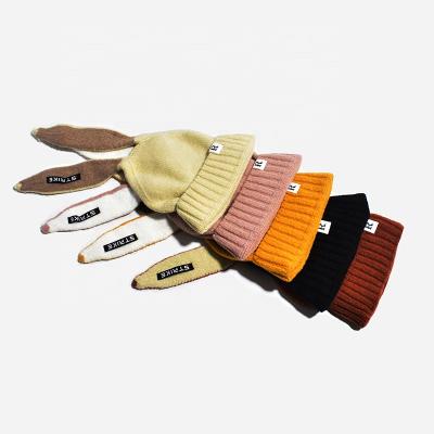 China 2021 COMMON Wholesale Factory Price Rabbit Earflap Knit Beanies Women Girl Rabbit Winter Warm Hats Ready To Ship for sale