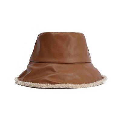 China 2021 new plush fashion vintage style leather bucket hat for men and women winter hat for sale