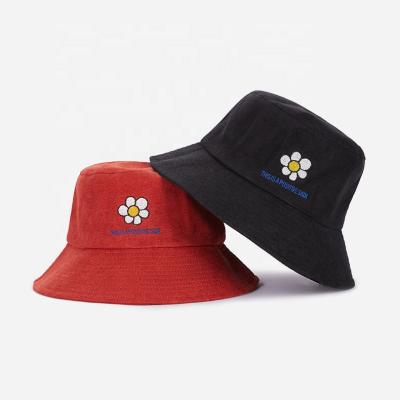 China Plush New Style Classic Cotton Made Sun Bucket Hats For Women And Kids Sunflower Logo Bucket Hat for sale