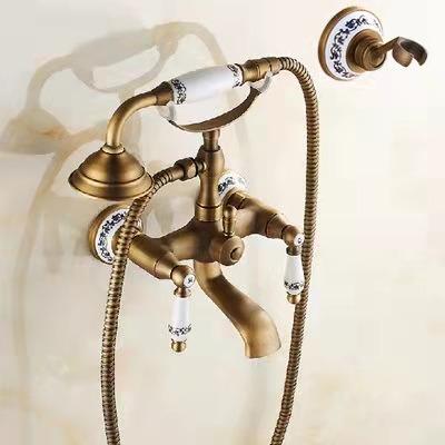 China Without Slide Bar Classic Oil Brarh Rubber Bronze Tub Faucet Set Wall Mount Brass Shower Mixer Tap Faucet With Porcelain Handle for sale