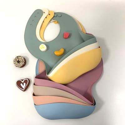 China Customized Baby Soft BPA Free Food Grade Silicone Baby Bibs Unisex Adjustable Bibs for sale