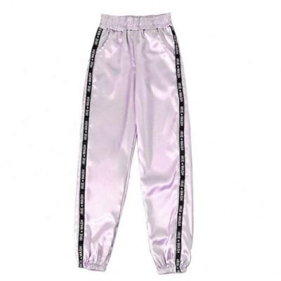 China 2020 hot custom women's anti-pilling harem pants FB Harajuku shiny jogger pants sport ribbon pants for sale