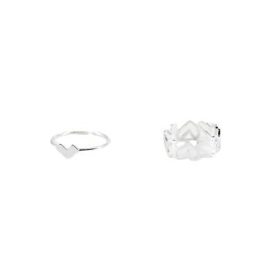 China Simple Style Female Light Luxury Personality Ins Style Ring Design Niche Heart Ring Cavity Love Set Simple Temperament Index Ring for sale