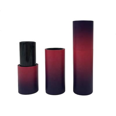 China Cosmetics round slim lipstick tube packaging empty lip balm tube and container for sale