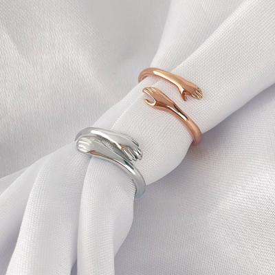 China TRENDY Fashion Embrace Hands Kiss Ring Silver Romantic Couples Rings Open For Lover for sale