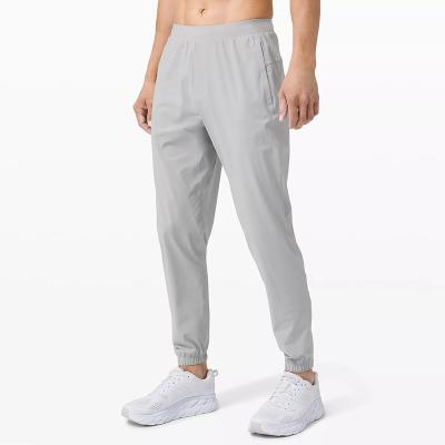 China 2021 New Design Breathable Logo Men Lightweight Custom Printing Running Joggers With Zips for sale