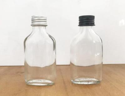 China Mini Small Glass Bottle 50ml Glass Flat Bottle Glass Wine Bottle for sale