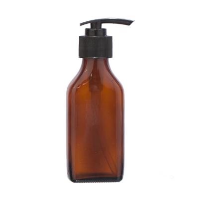 China 100ml Personal Care Amber Square Flat Glass Bottle With Sanitizer Shampoo Body Wash Lotion Pump for sale